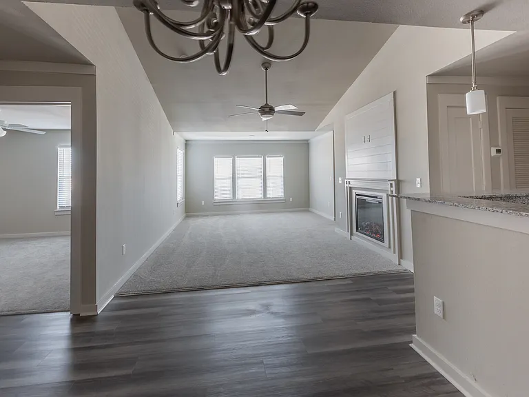 The Blue Heron. A two bedroom, two bath located on ground and second floors. Our Blue Heron floor plan does not have patio, but boasts additional living space with a whopping 1219 sq feet!