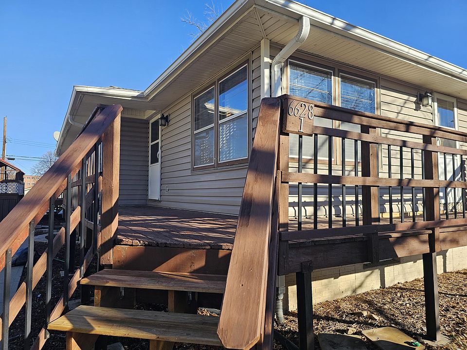 Front view. Two entrances off deck.