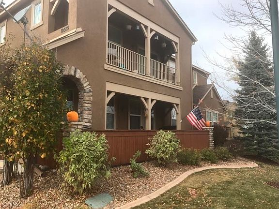 Ground floor unit. Side view of the covered and expanded patio area. It's an awesome place to hang out year round - relax, entertain, work. .