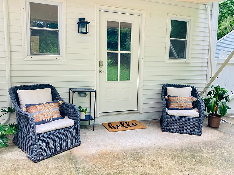 Private backyard patio with thoughtfully separated outdoor spaces.
Please note: separately leased garage apartment is home to a quiet long-term tenant and is NOT included with the main house rental.