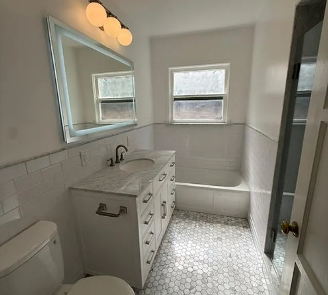Primary Bath with tub and separate shower. New remodel.
