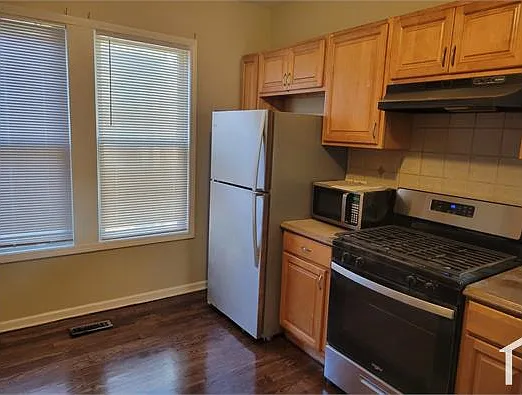 311 W 107th Pl — Photo 9