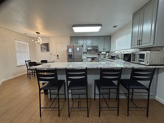 Just remodeled kitchen with brand-new appliances, granite countertop with fully backsplash, refreshed cabinets