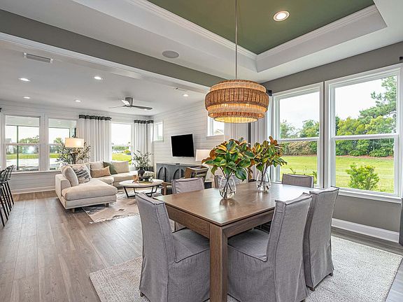 Dining open to the gathering room and kitchen