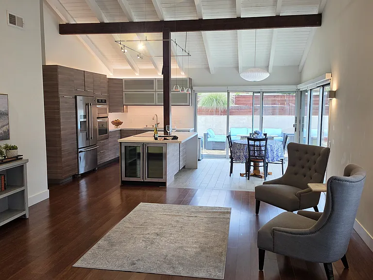 Open concept floor plan with high ceilings and lots of light.