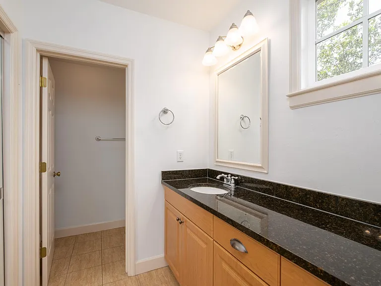 Master bathroom. Toilet and shower in separate area. Large closet.