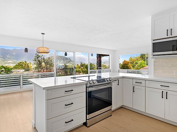 Newly renovated kitchen with views of the mountains.