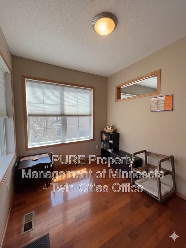 Building Photo - 8051 Larch Ln N
