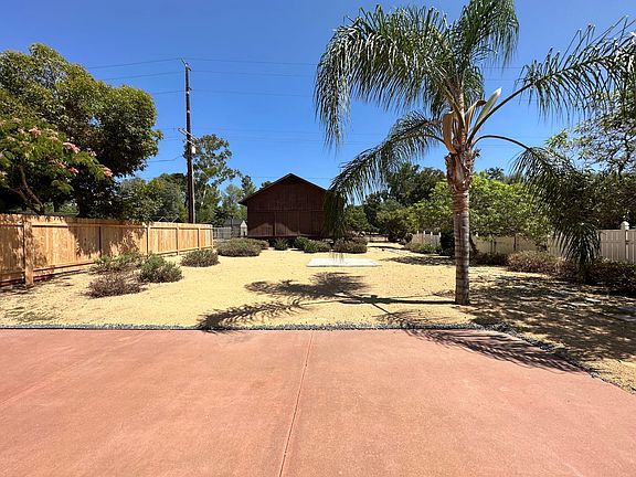 Huge backyard. View of the Backyard with Bonus structure that can be used as a gym, yoga studio, or storage.