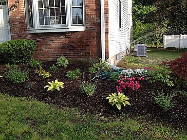 Flower Bed in front of townhome