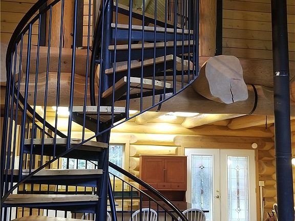 Beautiful, large Spiral Staircase will comfortably and safely accommodate large people.