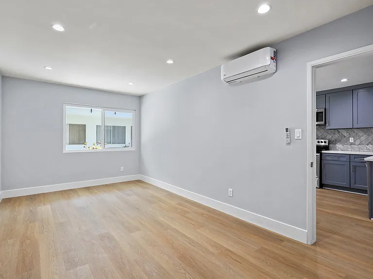 Large-Size Bedroom with Windows, and Vinyl Flooring