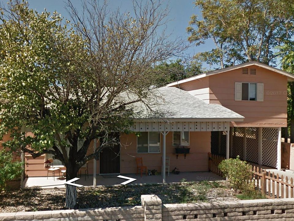Studio apartment is located above the carport with no shared walls