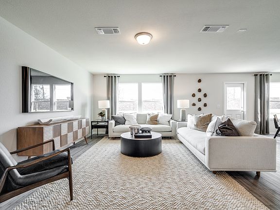 Spacious gathering room with large windows