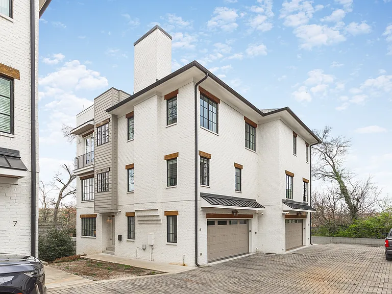 Exterior of our home. Enjoy a relaxing stay in our spacious, modern townhome, complete with a 2 car garage and private rooftop deck in one of Nashville's most coveted neighborhoods!