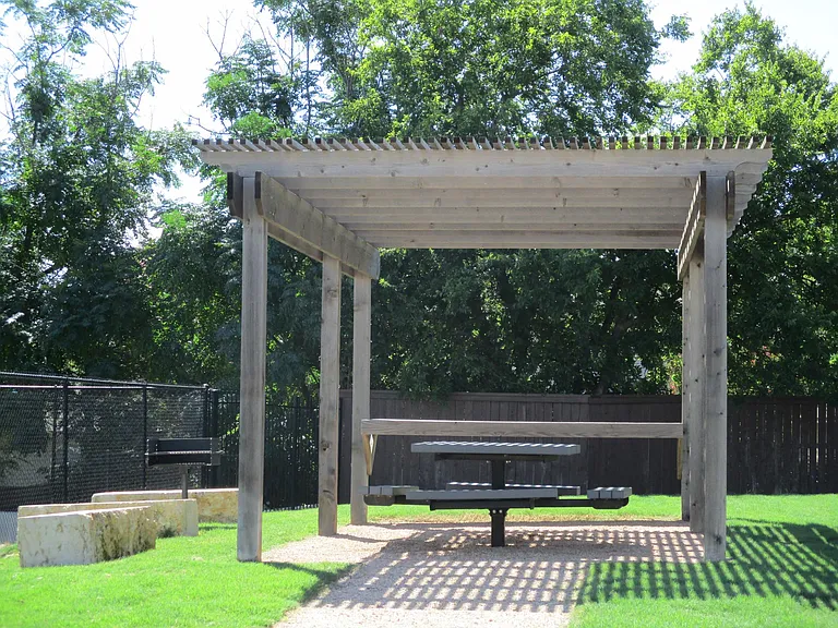 Common area Pergola with outdoor grill and picnic table