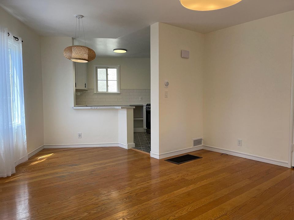 living room and dining room with kitchen bar.