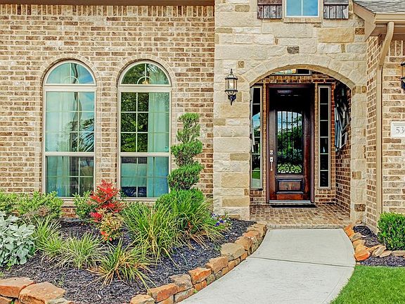 Very inviting entry with beautiful front door.