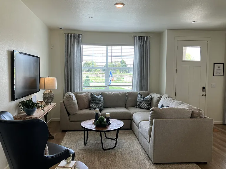 Sample of same floor plan, different finishes, staged with furniture.