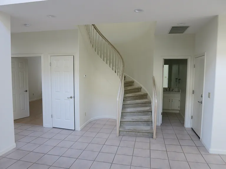 2nd Master Bedroom suite entry on the left, Staircase and half bath on the main level