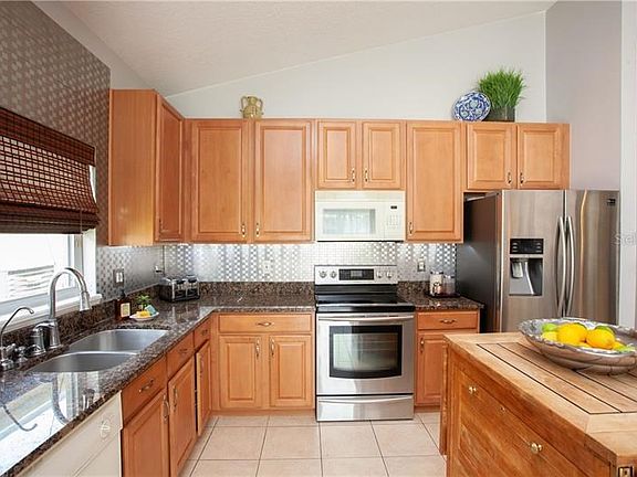 Stainless Steel Appliances Along with Granite Counter Tops