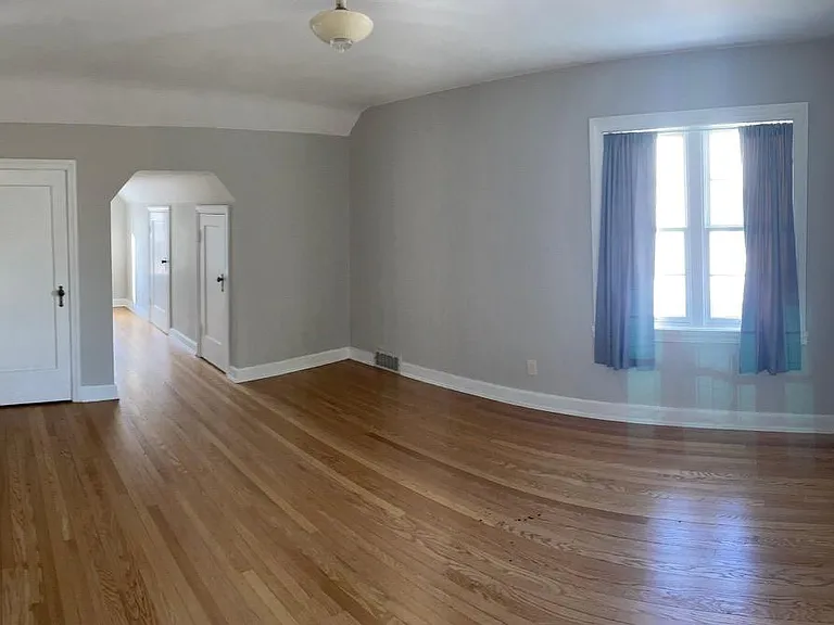 Largest 2nd floor bedroom w/ long dormer hall containing multiple storage areas (3), and main closet.