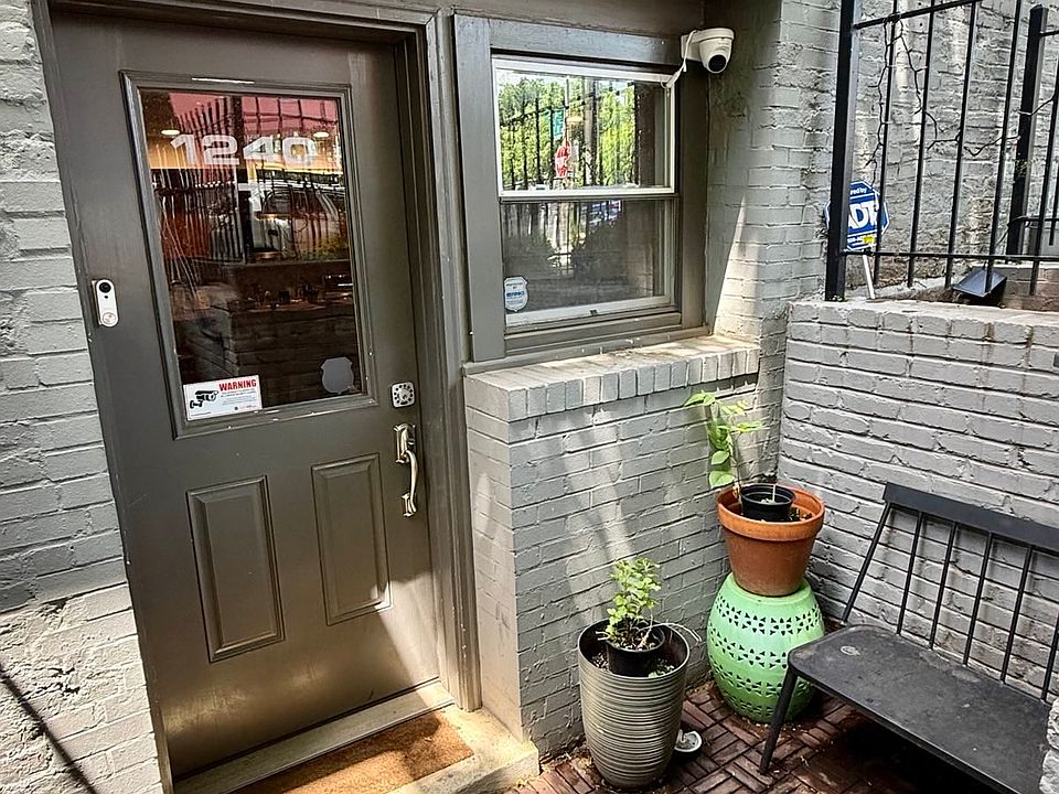 A small space by the front door makes for a great place to slip shoes on and off or drop the grocery bags for a minute.