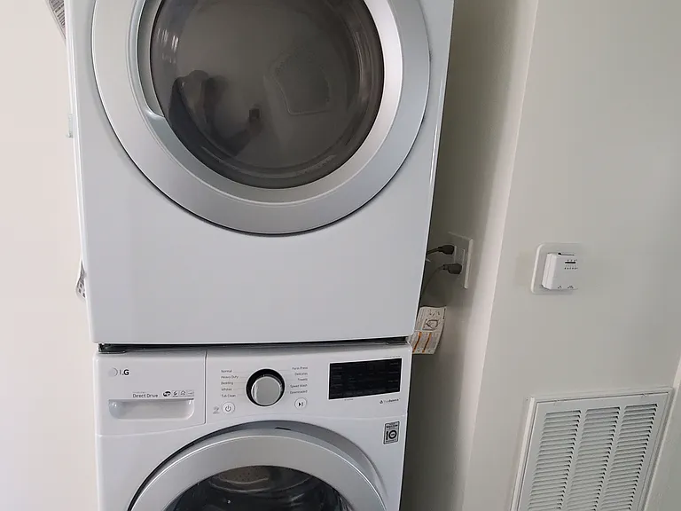 Laundry unit, shared with all tenants (upstairs and downstairs).