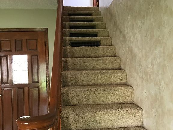 Stairs off living room