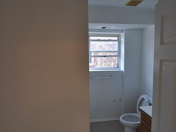 Newly tiled top level bathroom