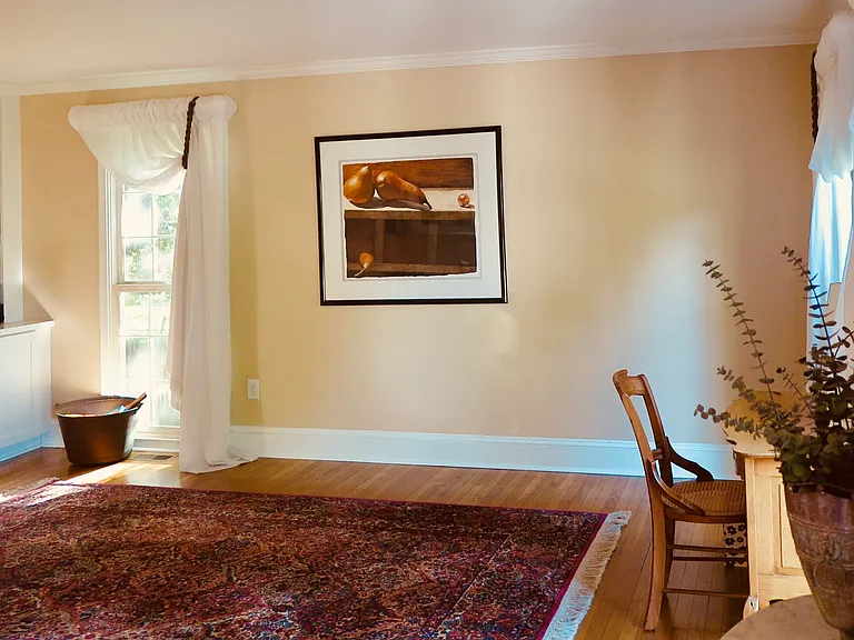 Living Room/Flex Room to immediate right of foyer and center hallway.