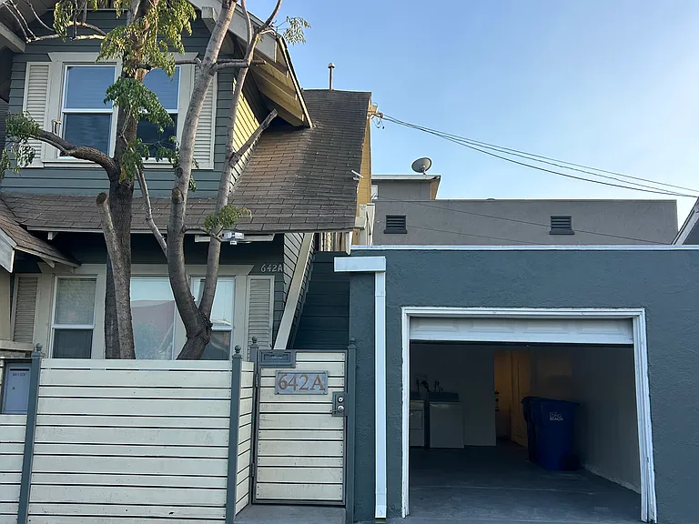 Front Entrance (Gated) + Open Garage
