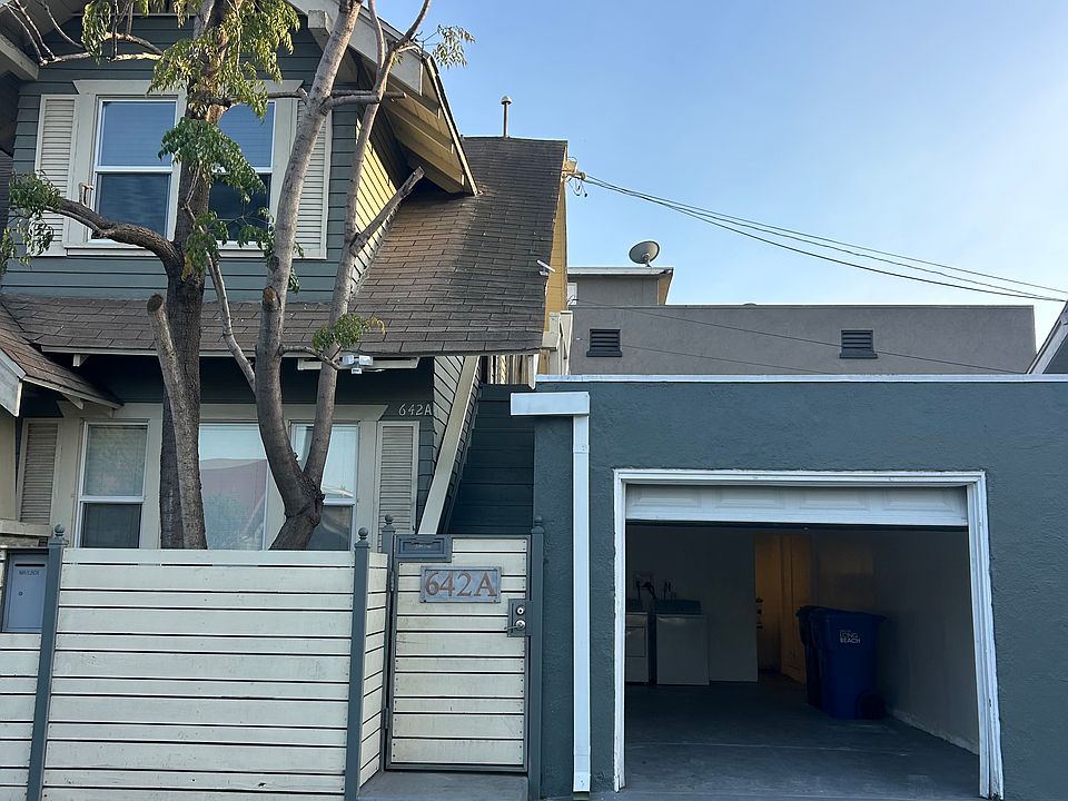Front Entrance (Gated) + Open Garage