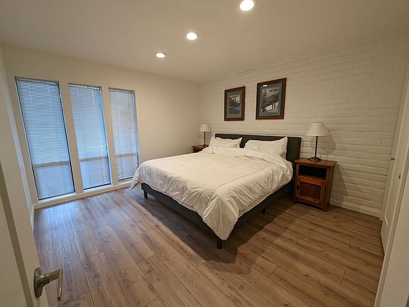 Lower level bedroom 1 with King size bed with brand new memory foam mattress.