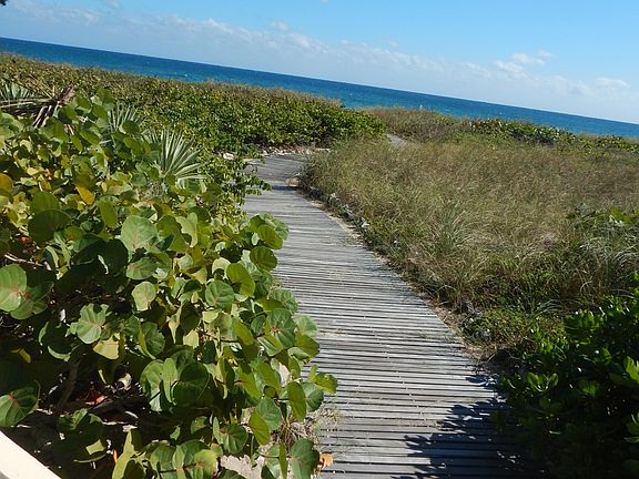 Easy access to beach with wooden walkway.