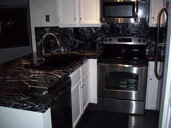 Great open kitchen with nice stainless steel appliances