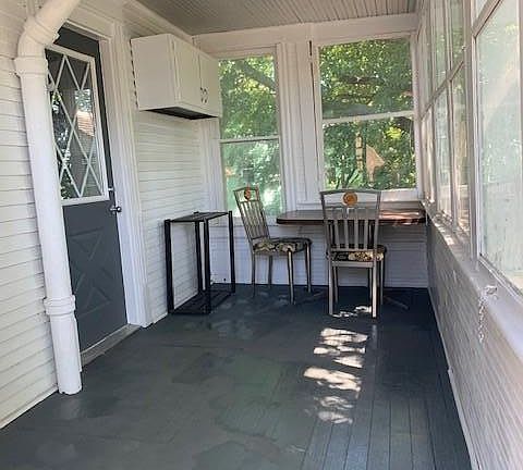 Back porch with exit to parking/trail
