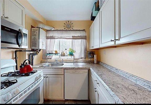 3rd image of 10526 Avenue N #1