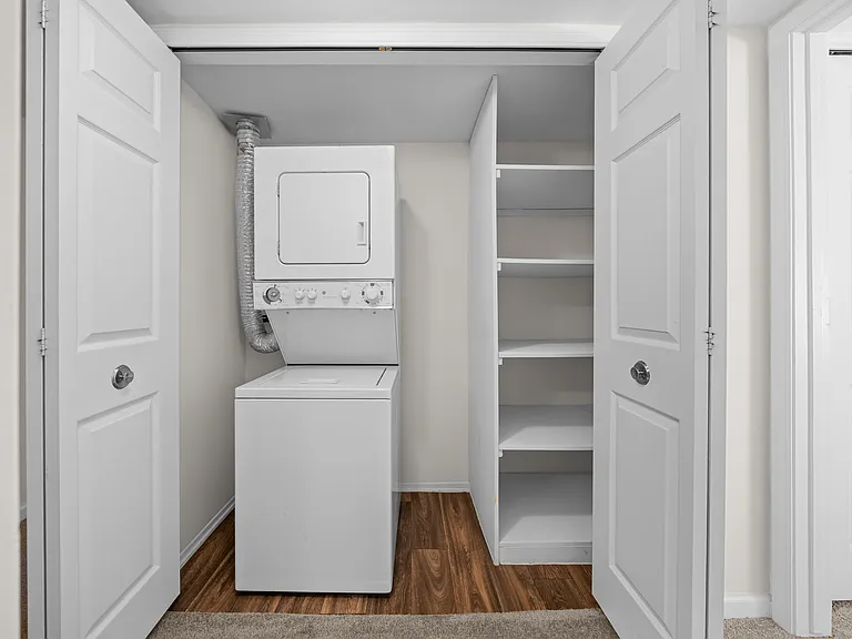 Spacious In-unit Laundry and Linen Closet at Lakeside Village Apartments Clinton Township MI