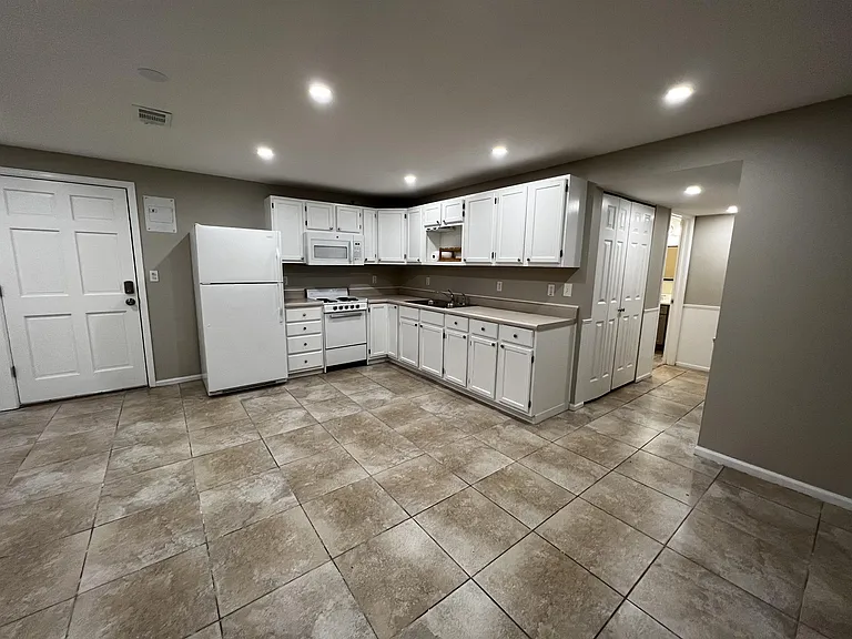 Kitchen and door to exterior