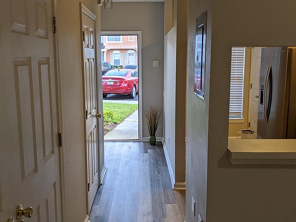 front hall with spacious alcove behind front door