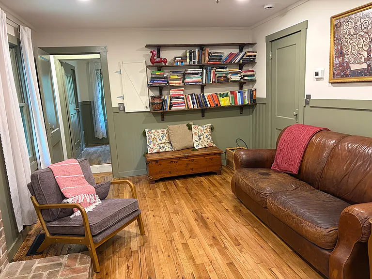 Living room with built in wall shelves