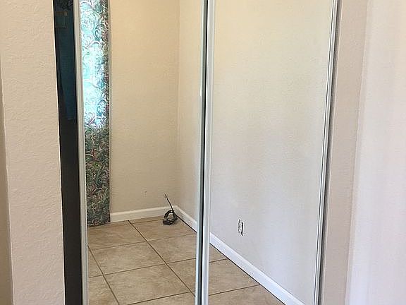 His n hers mirrored closets