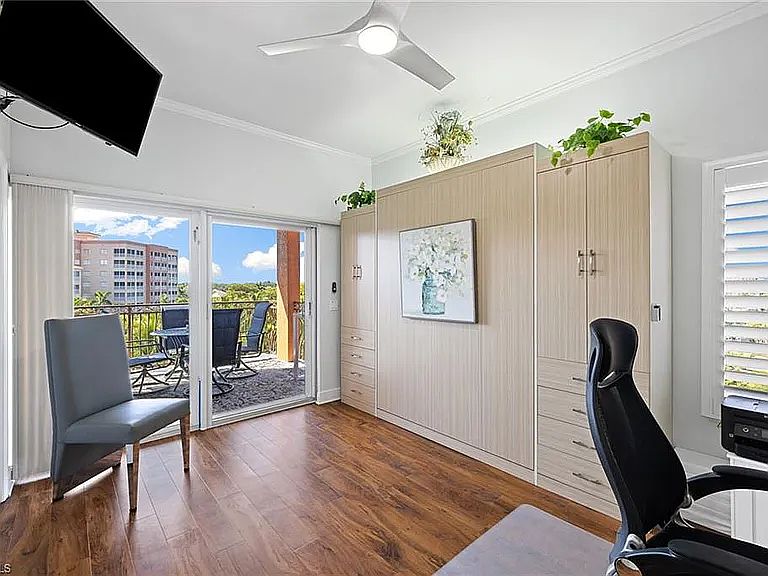 Office with new, high quality queen wall bed.
