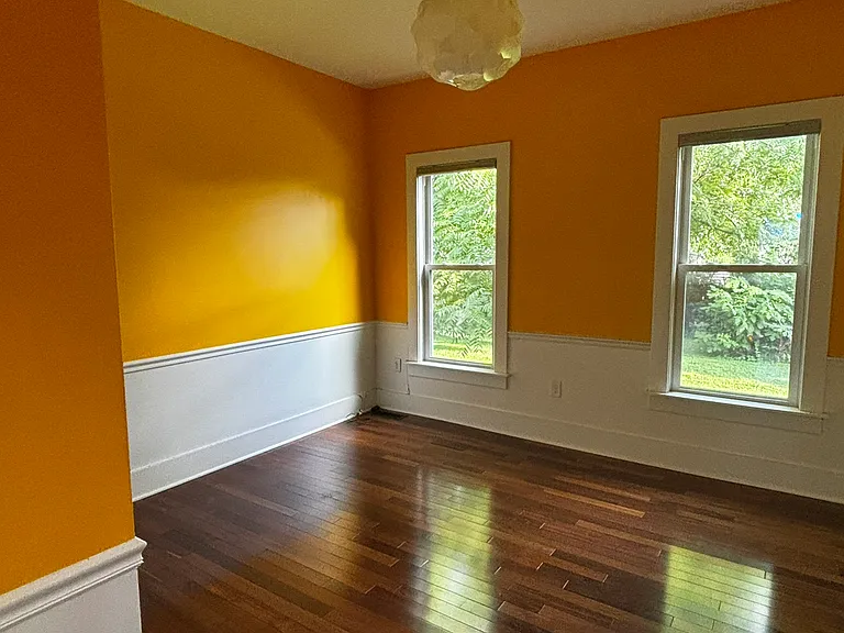Bedroom 2 with view of backyard and lots of closet space.