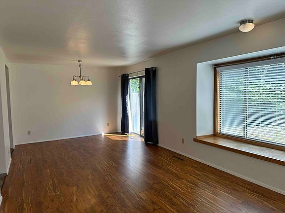 Living area downstairs-Photo July 2025 of 809 unoccupied.