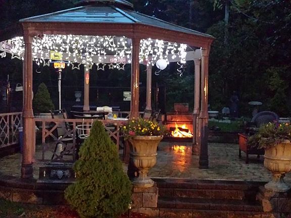 patio with fireplace