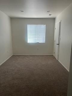 Bedroom view of window and door