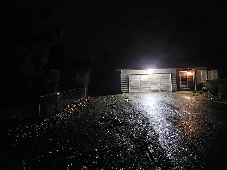 This area to the left of garage is for parking recreational vehicle. Backyard is huge and fully fenced. Enough room for a large garden and area for play/entertaining.