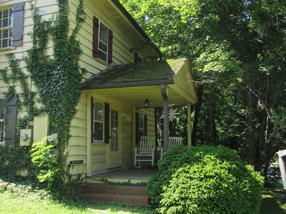 Front of house facing Main St with porch.